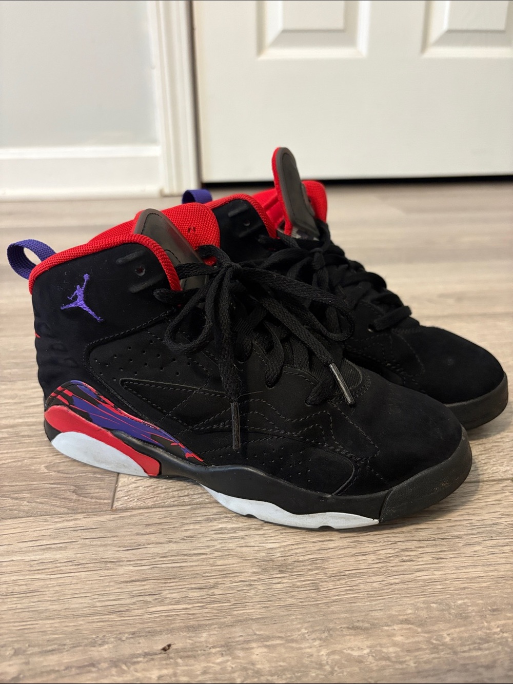 Jordan Kids Black Sneakers with Red and Purple Accents